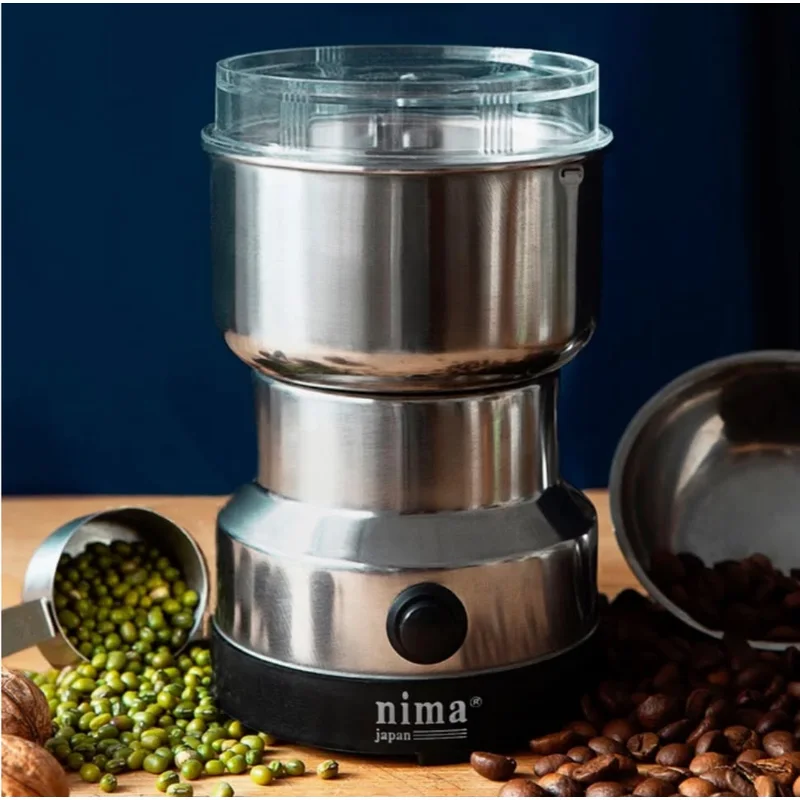 Molinillo eléctrico de acero inoxidable con granos de café y semillas